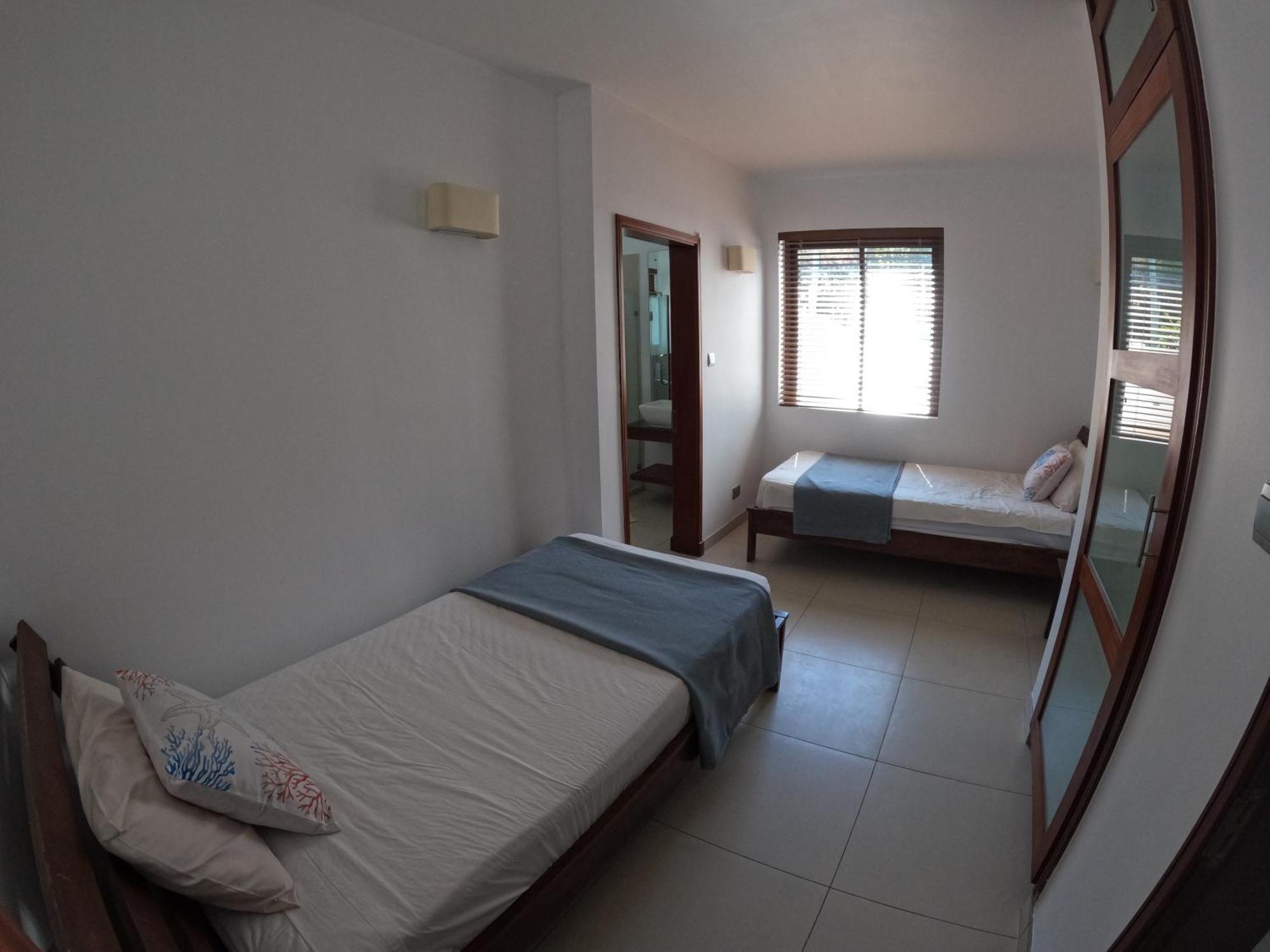 Olana Blue - Beachfront Apartment Rivière Noire Dış mekan fotoğraf